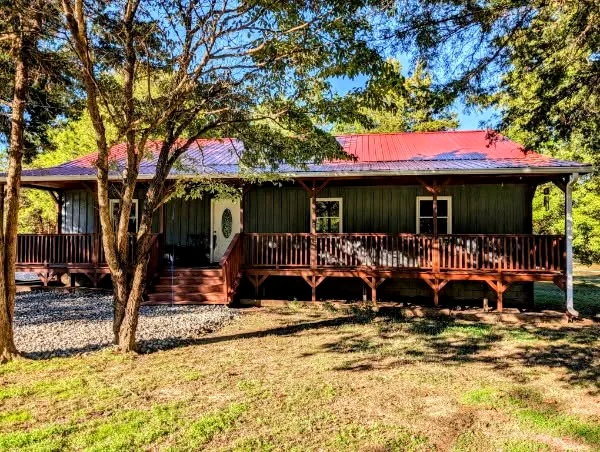 Country home with wraparound porch